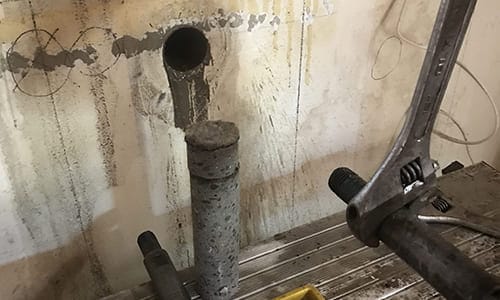 drilling holes in wall